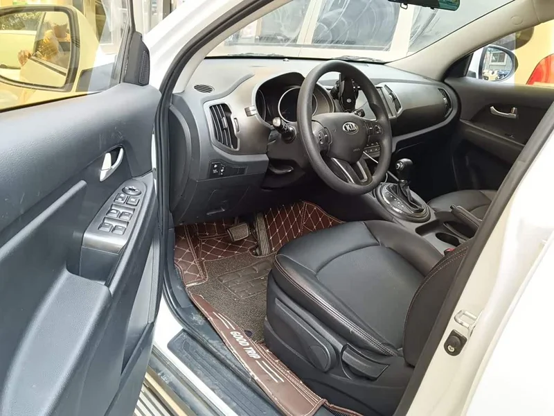 Kia Sportage — фото 12