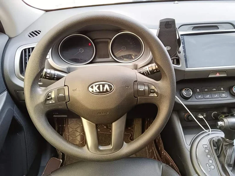 Kia Sportage — фото 6