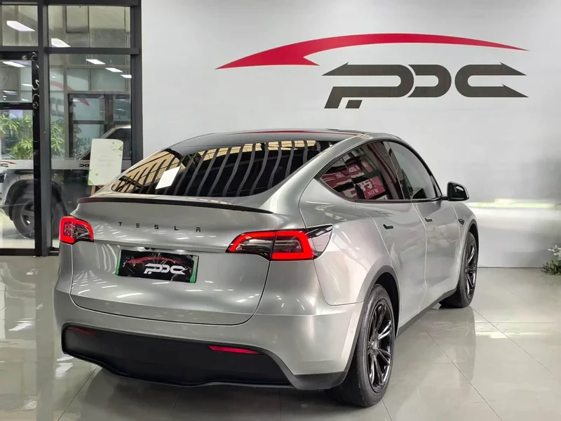 Tesla Model Y — фото 16