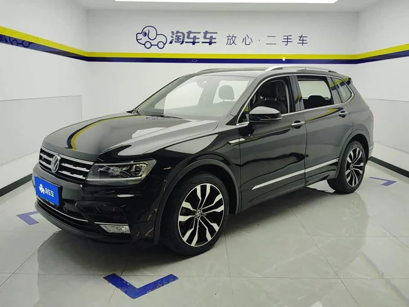 Volkswagen Tiguan L — фото 1