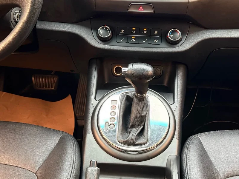 Kia Sportage — фото 11