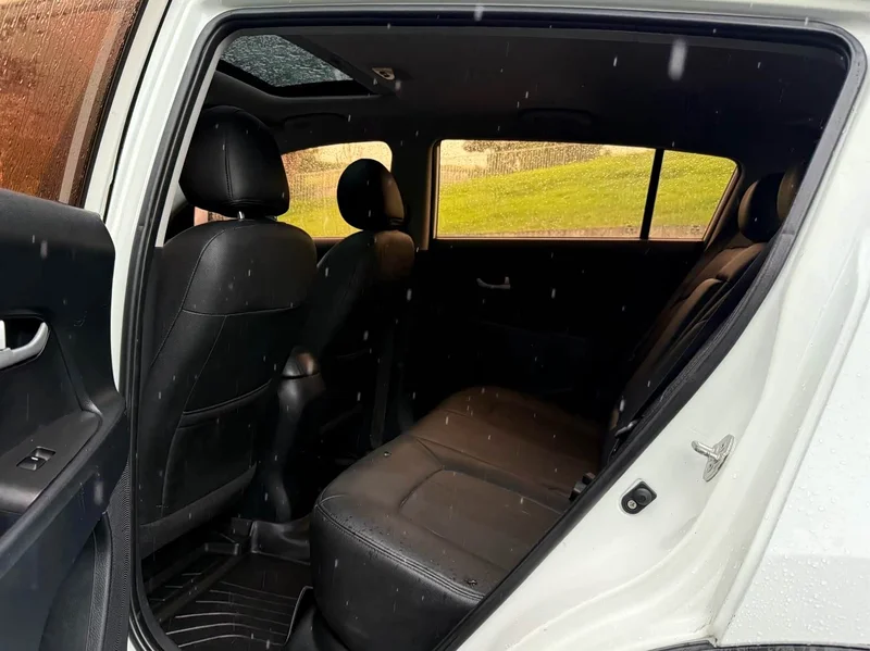 Kia Sportage — фото 13