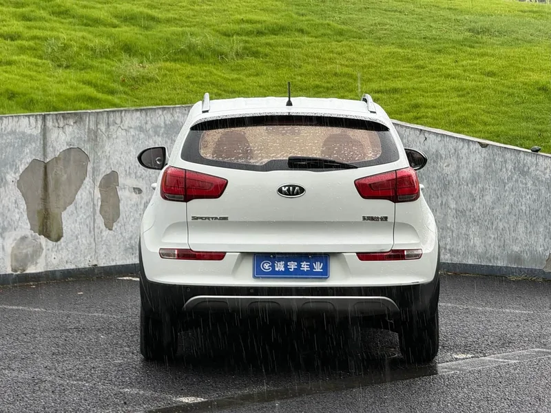 Kia Sportage — фото 14