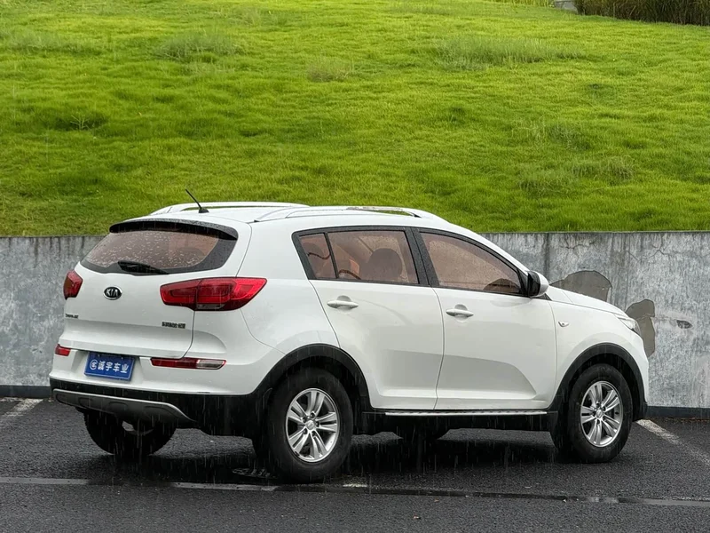 Kia Sportage — фото 16