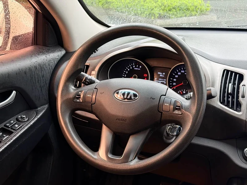 Kia Sportage — фото 6