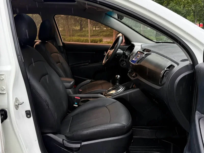 Kia Sportage — фото 9