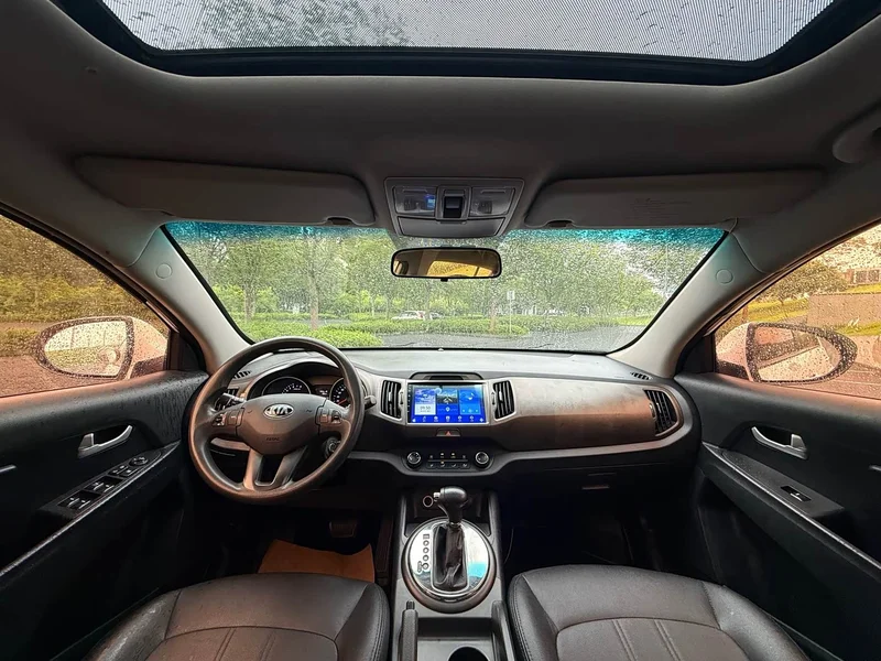 Kia Sportage — фото 10