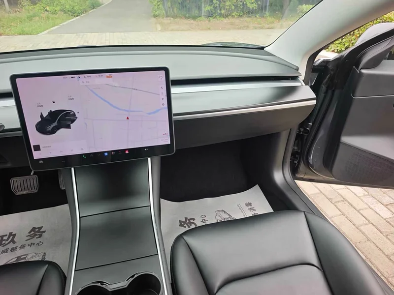 Tesla Model 3 — фото 14