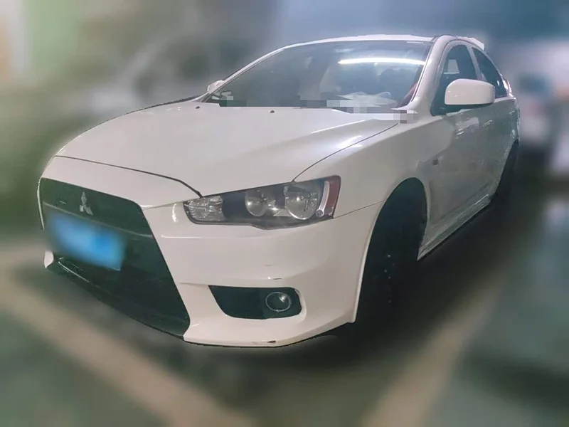 Mitsubishi Lancer EX — фото 1