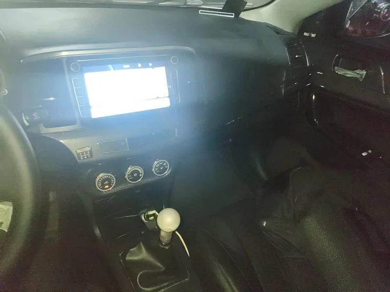 Mitsubishi Lancer EX — фото 14