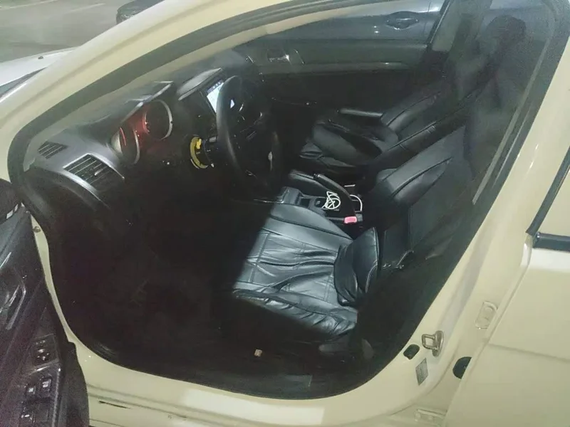 Mitsubishi Lancer EX — фото 16