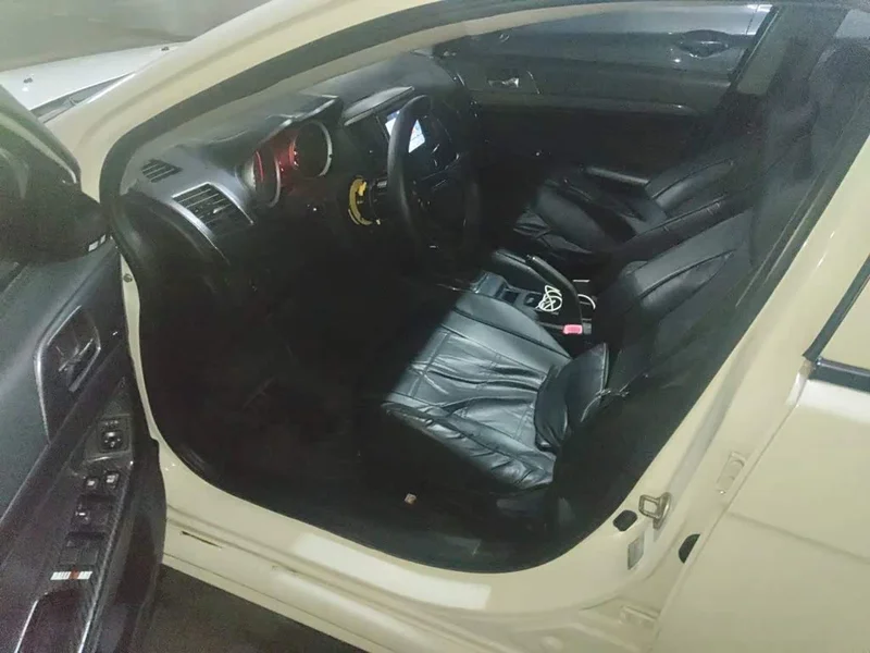 Mitsubishi Lancer EX — фото 17