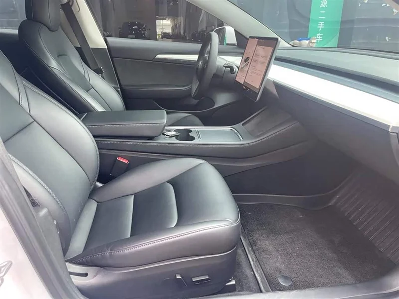 Tesla Model 3 — фото 11