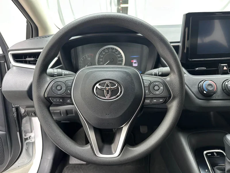 Toyota Corolla — фото 7