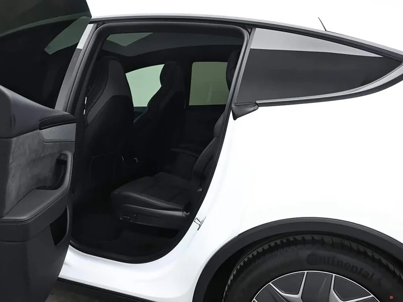 Tesla Model Y — фото 13