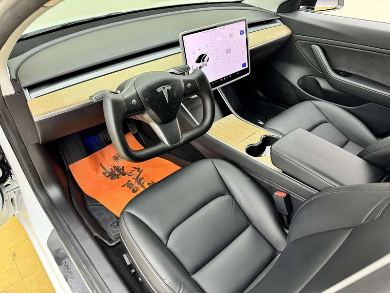 Tesla Model 3 — фото 7
