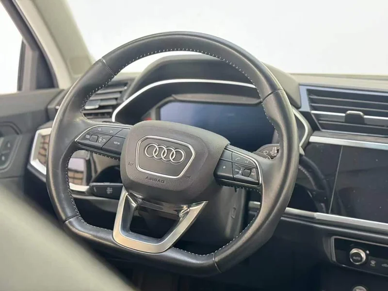 Audi Q3 — фото 11