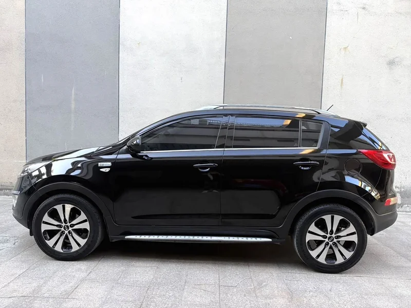 Kia Sportage — фото 8