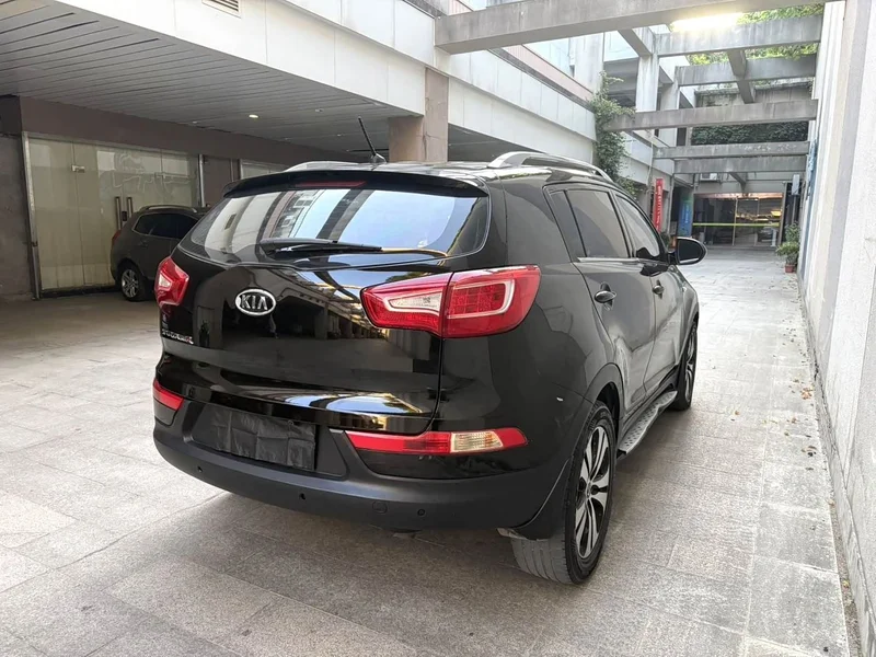 Kia Sportage — фото 9