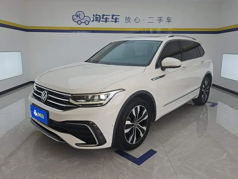 Volkswagen Tiguan L — фото 1