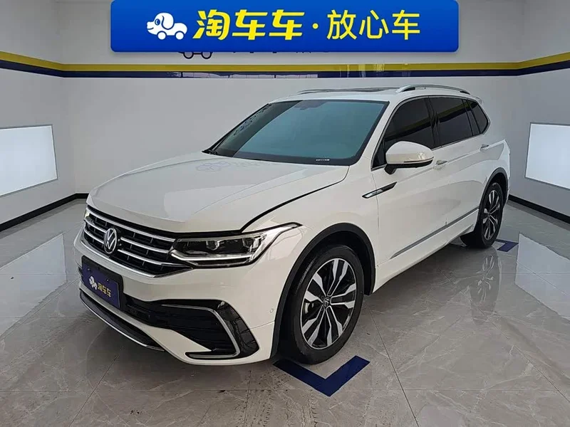 Volkswagen Tiguan L — фото 1