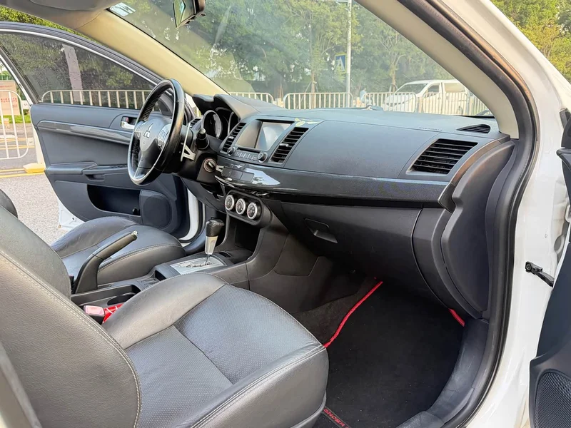 Mitsubishi Lancer EX — фото 7