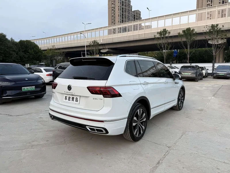 Volkswagen Tiguan L — фото 10
