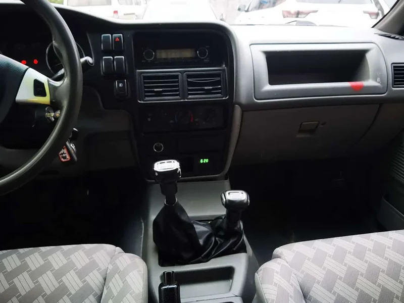 Isuzu Isuzu Pickup — фото 12