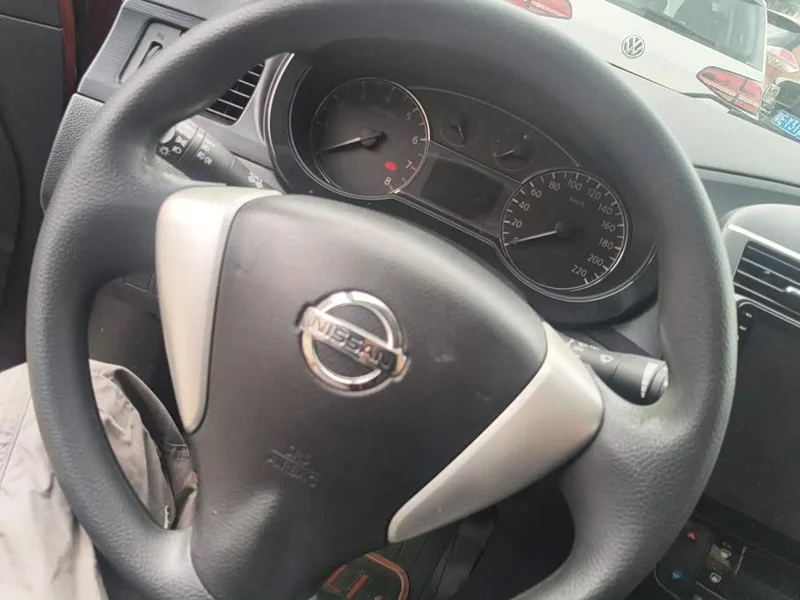 Nissan Tiida — фото 15