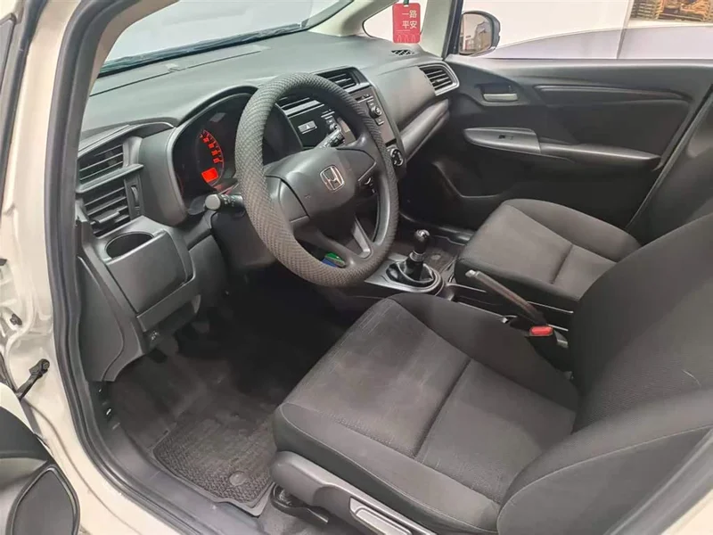 Honda Fit — фото 13