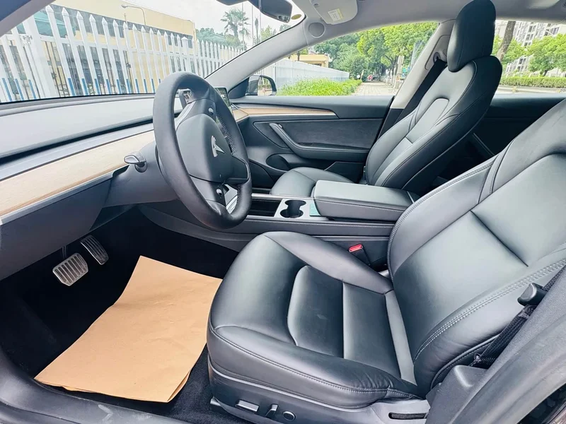 Tesla Model 3 — фото 12