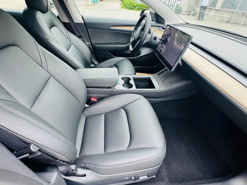 Tesla Model 3 — фото 18