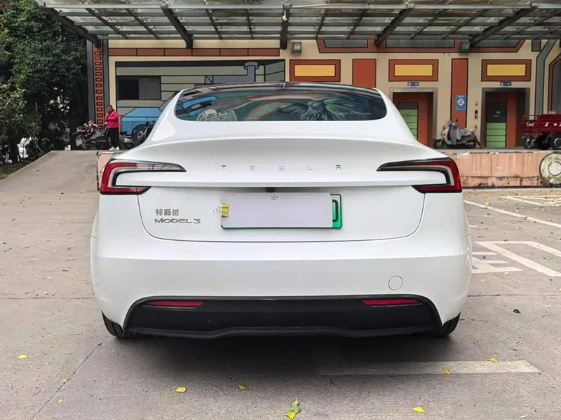 Tesla Model 3 — фото 14