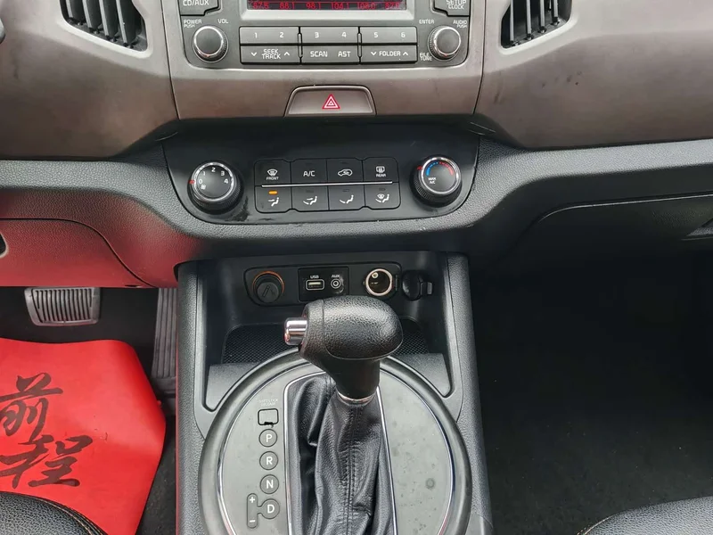 Kia Sportage — фото 11