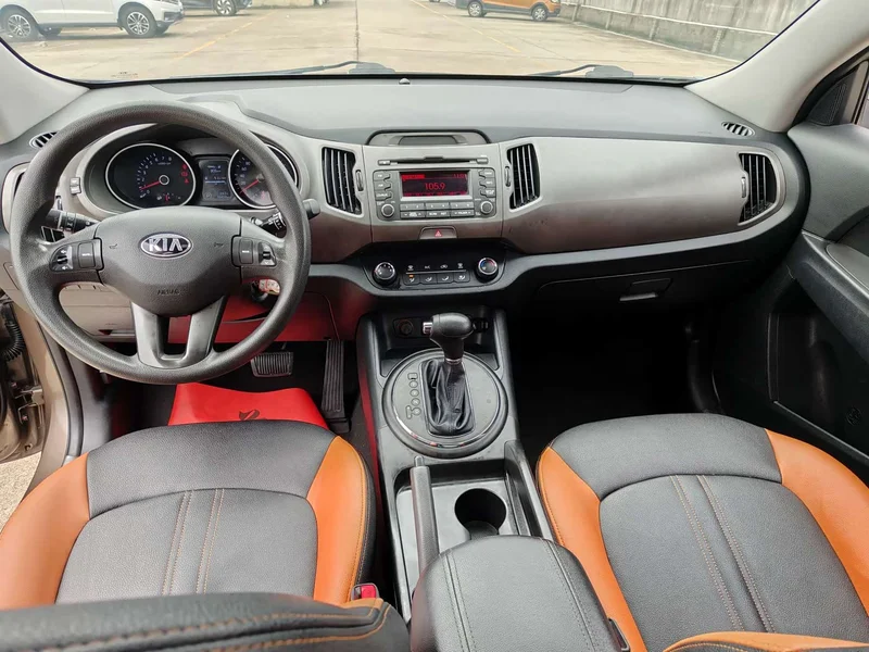 Kia Sportage — фото 12