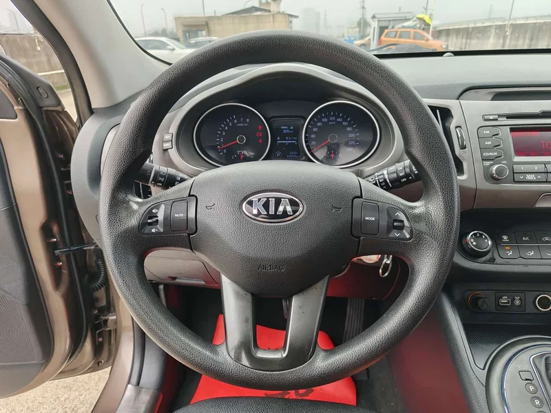 Kia Sportage — фото 13