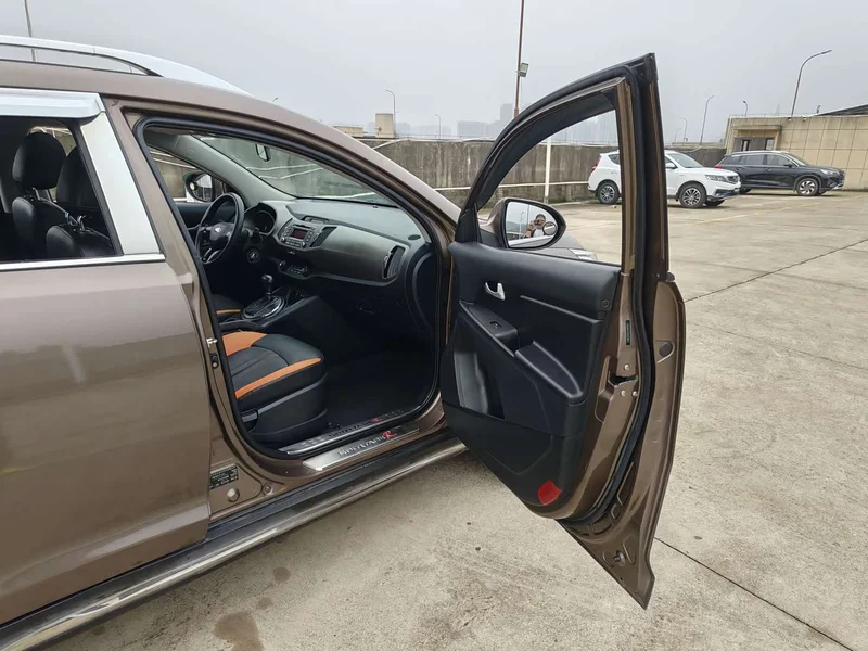 Kia Sportage — фото 18