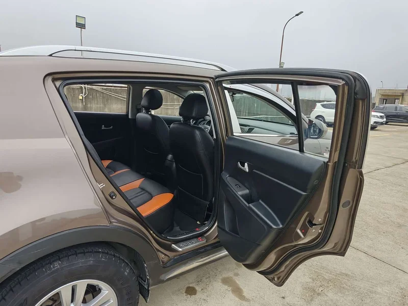 Kia Sportage — фото 19