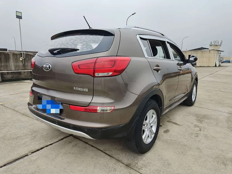 Kia Sportage — фото 6