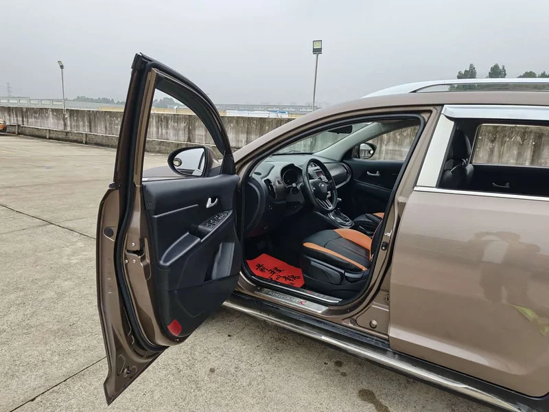 Kia Sportage — фото 7