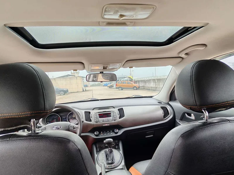 Kia Sportage — фото 9