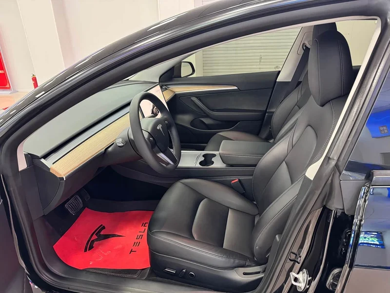 Tesla Model 3 — фото 9