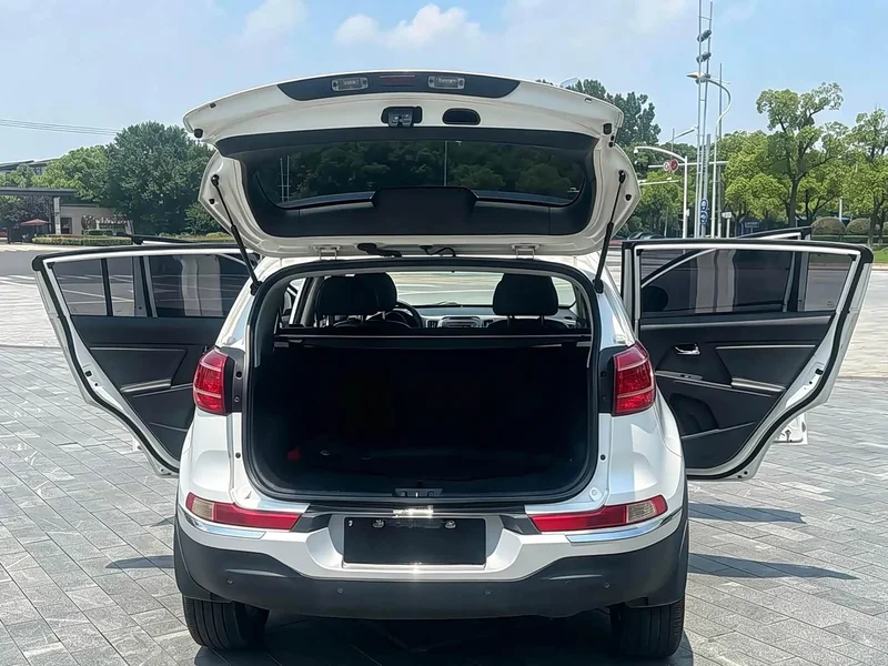 Kia Sportage — фото 11