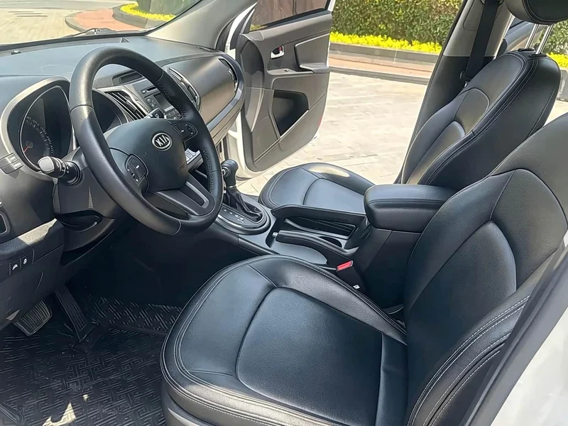 Kia Sportage — фото 12