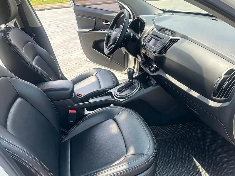 Kia Sportage — фото 13