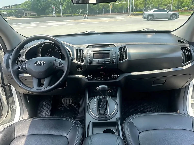 Kia Sportage — фото 16