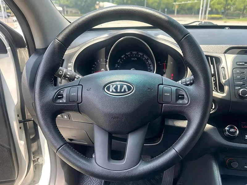 Kia Sportage — фото 17