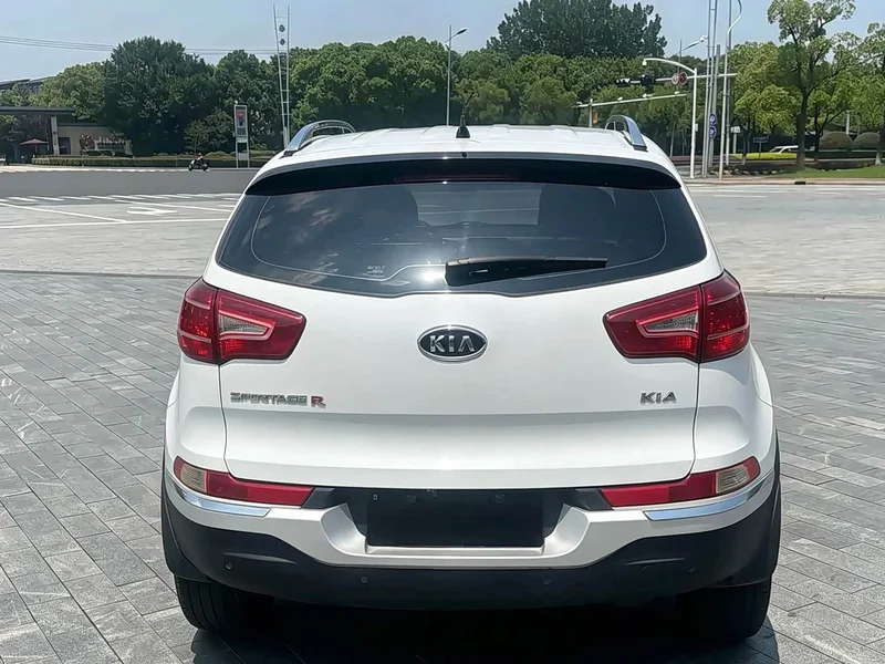 Kia Sportage — фото 6