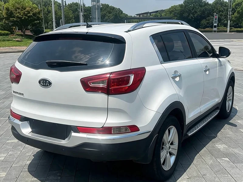 Kia Sportage — фото 7