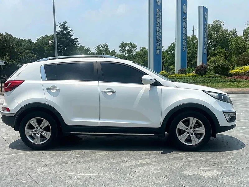 Kia Sportage — фото 8